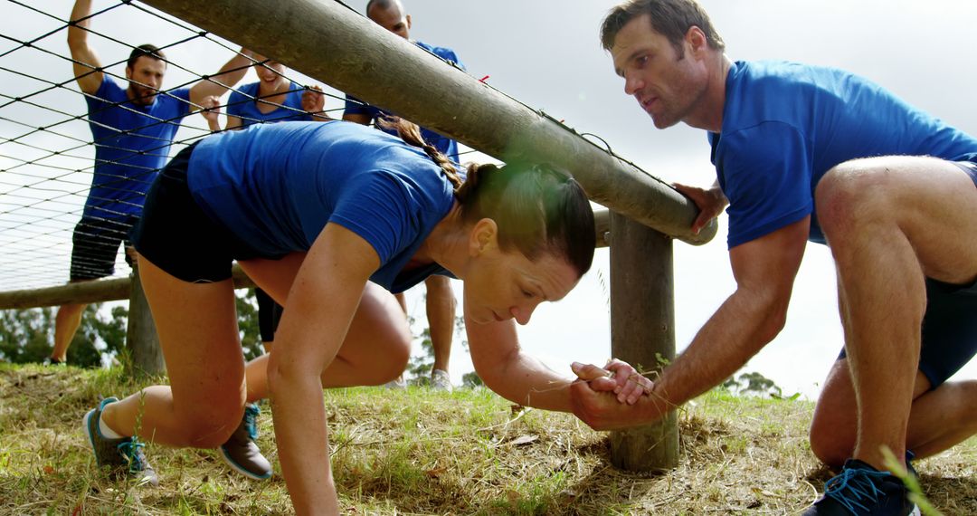 Group Participating in Outdoor Obstacle Course Training - Free Images, Stock Photos and Pictures on Pikwizard.com