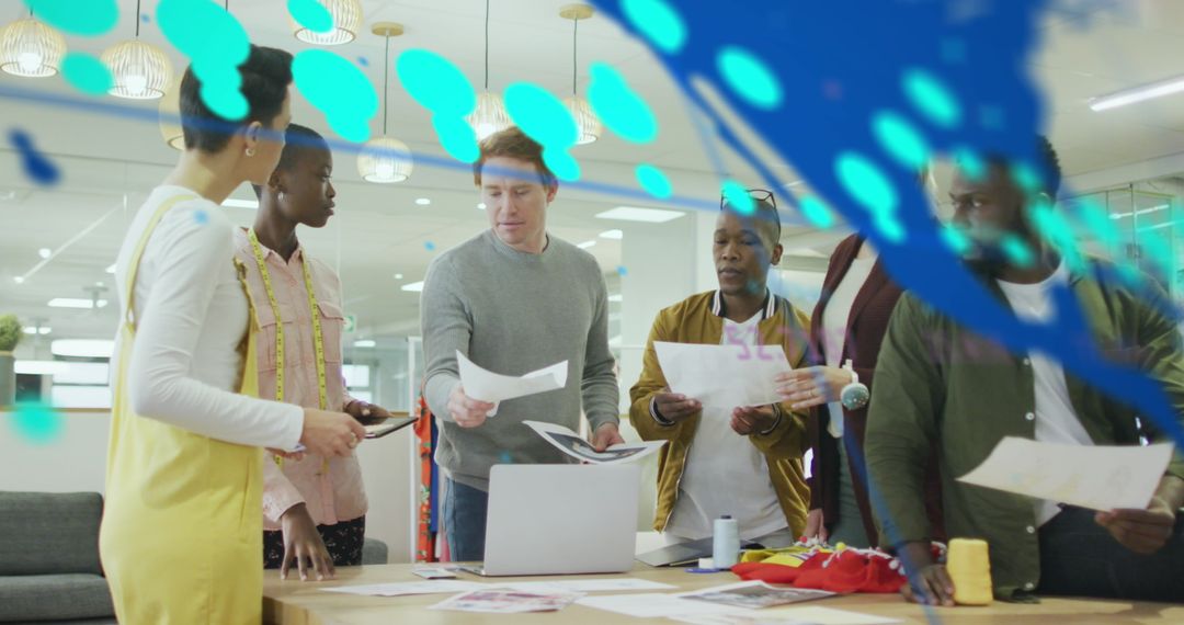 Diverse Team Collaborating with Technology Overlays in Modern Office