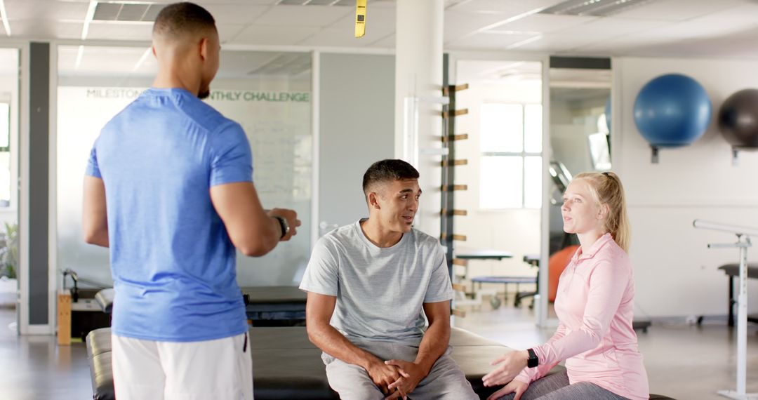 Group Discussing Therapy Progress at Rehabilitation Center