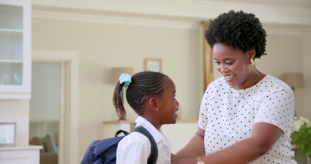 Mother Encouraging Child with Uniform in Morning Routine