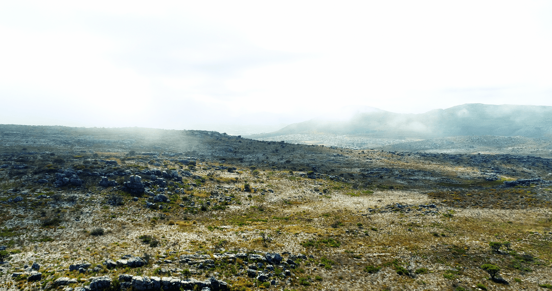 Serene Mountainous Landscape and Cloudy Sky Scene Transparent