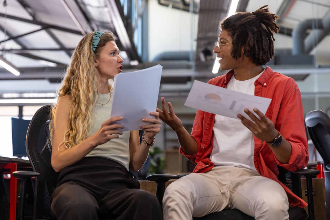 Collaborative Team Discussion in Modern Office Workspace