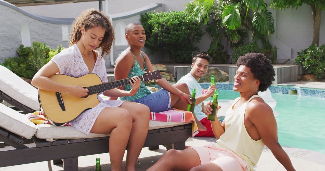 Diverse Group Enjoying Relaxing Poolside Guitar Session