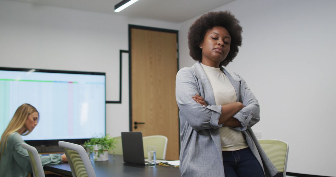 Confident Businesswoman Posing in Modern Office Environment