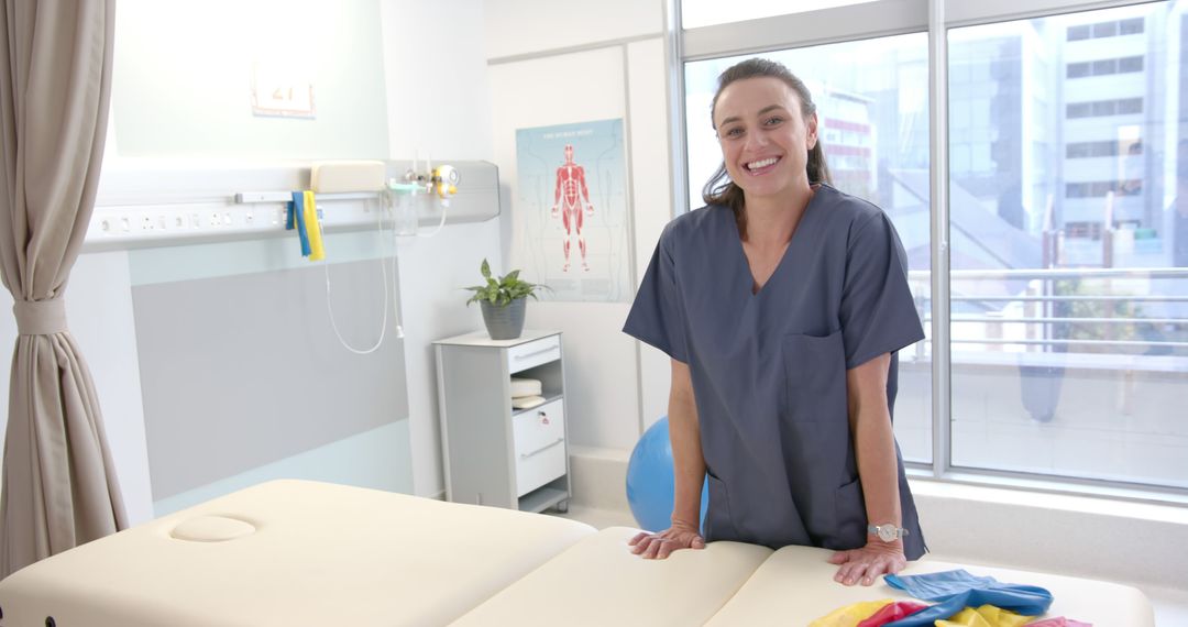 Smiling Female Physiotherapist in Modern Clinic - Free Images, Stock Photos and Pictures on Pikwizard.com