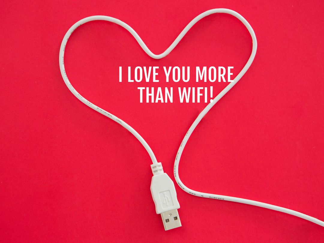 USB Cable Shaping Heart on Red Background for Digital Love Concept