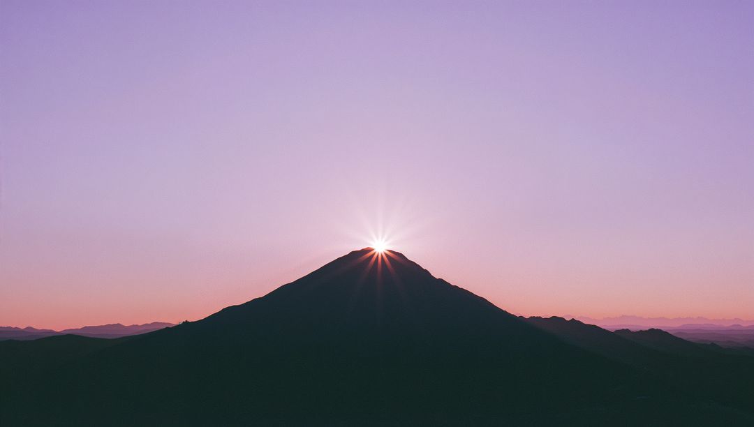 Sunburst at Mountain Peak with Pastel Dawn Gradient