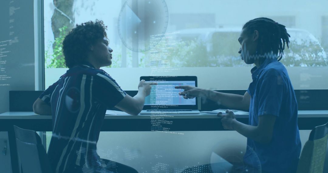 Developers Collaborating On Code Revision In Modern Office