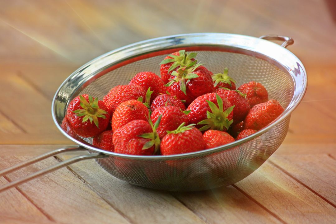 Strawberries on Stainless Steel Framed Strainer - Free Images, Stock Photos and Pictures on Pikwizard.com