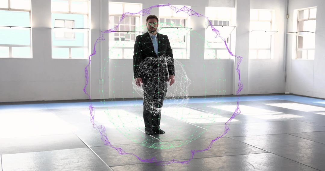 Businessman standing in empty studio interacting with futuristic wireframe sphere