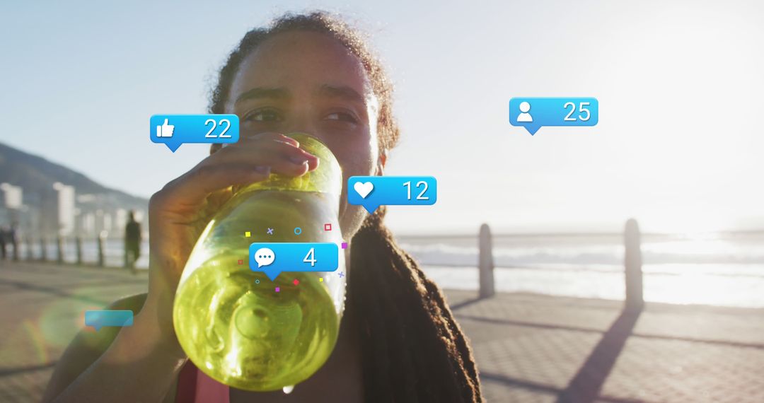 Athletic Woman Drinking Water Bottle with Social Media Likes Counter on Seaside Promenade - Free Images, Stock Photos and Pictures on Pikwizard.com