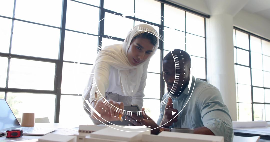 Architects Collaborating on Urban Design Project in Modern Studio