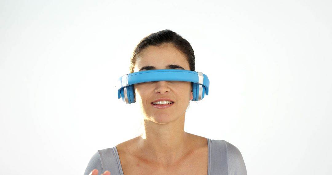 Woman Experiencing Virtual Reality with Unique Headset - Free Images, Stock Photos and Pictures on Pikwizard.com