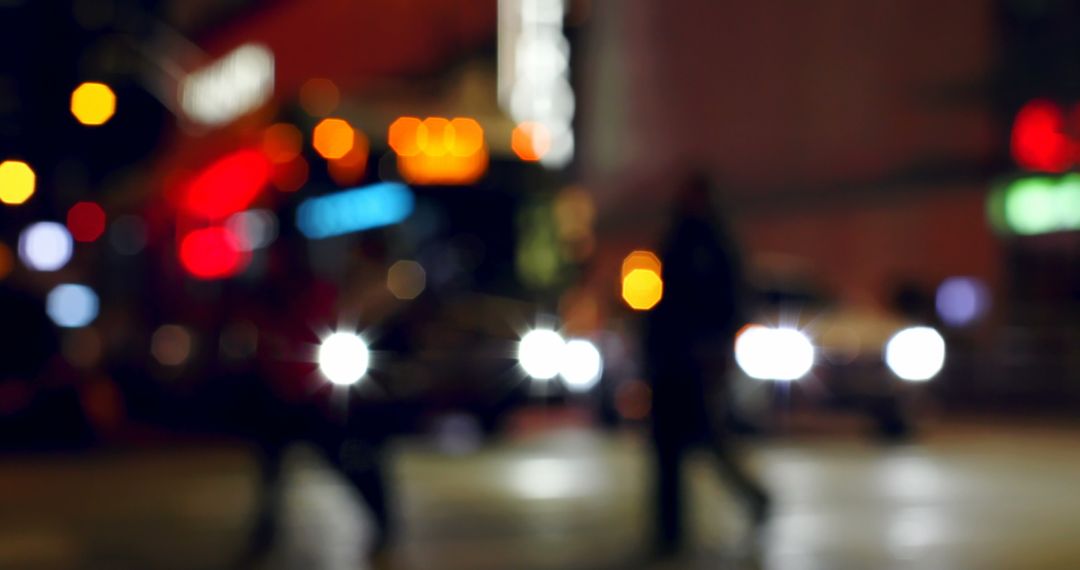 Night city street with colorful bokeh and vehicle lights