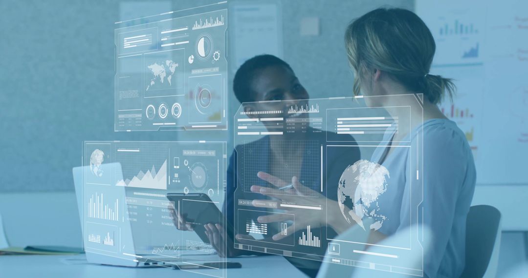 Businesswomen Collaborating on Advanced Data Analysis with Futuristic Interfaces
