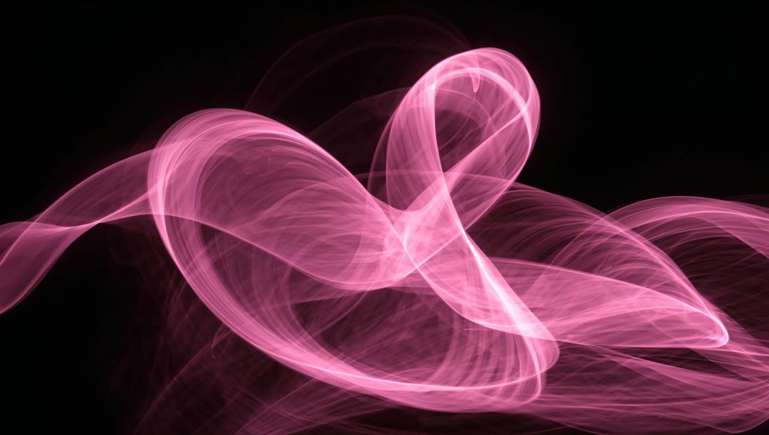 Flowing Pink Ribbon Light Patterns on Black Background