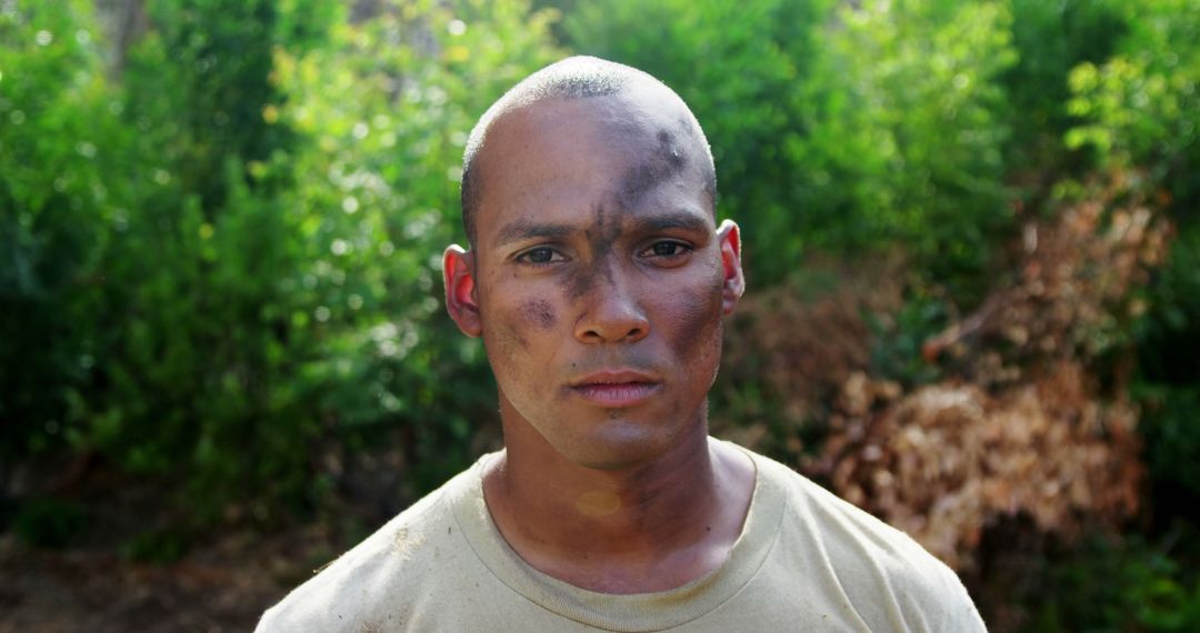 Portrait of Determined Soldier in Uniform with Dirt on Face - Free Images, Stock Photos and Pictures on Pikwizard.com