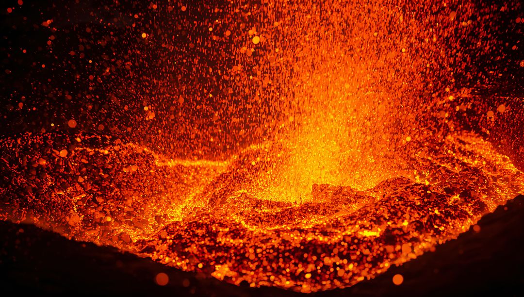 Fiery Molten Lava Bubbling Within a Volcanic Vent at Night