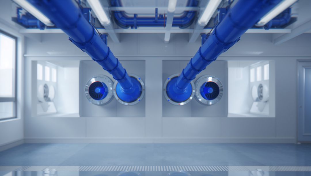 Blue industrial ductwork with circular intake fans in clean mechanical room, HVAC systems