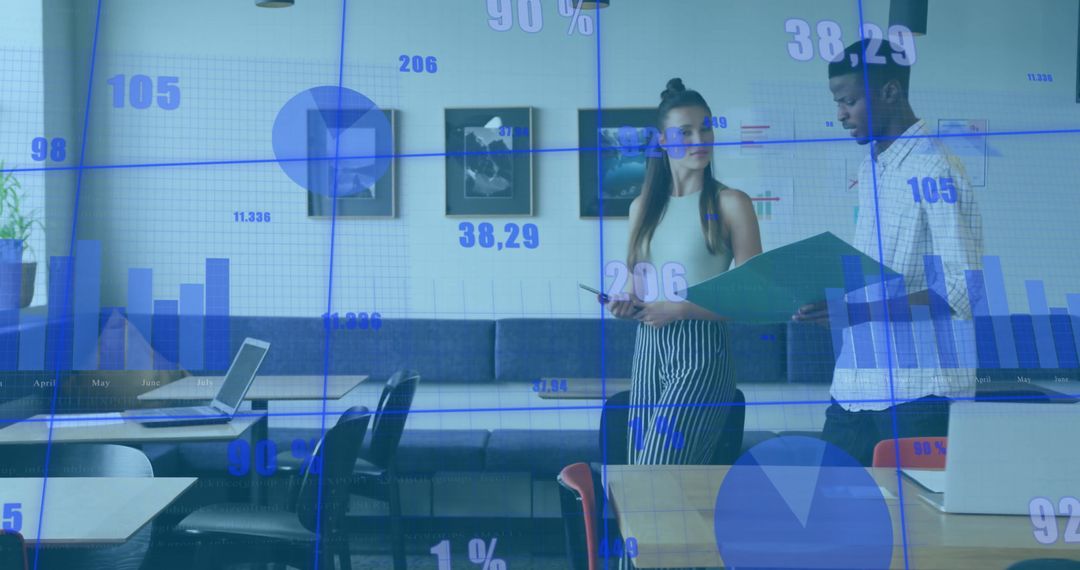 Coworkers Analyzing Data with Graphical Overlays in Modern Office