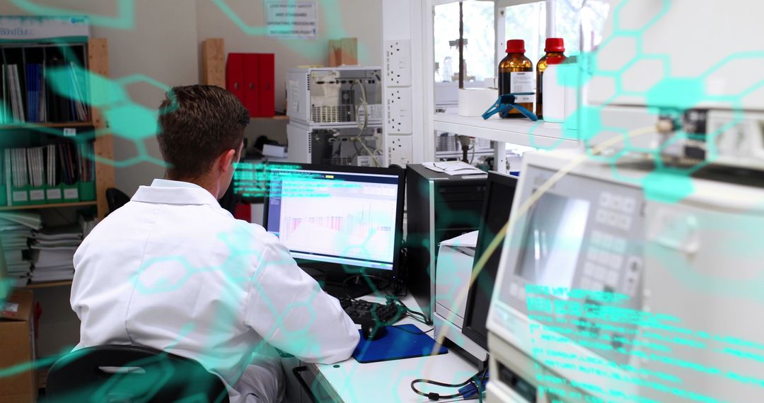 Scientist Analyzing Data in Laboratory with Computer Technology - Free Images, Stock Photos and Pictures on Pikwizard.com
