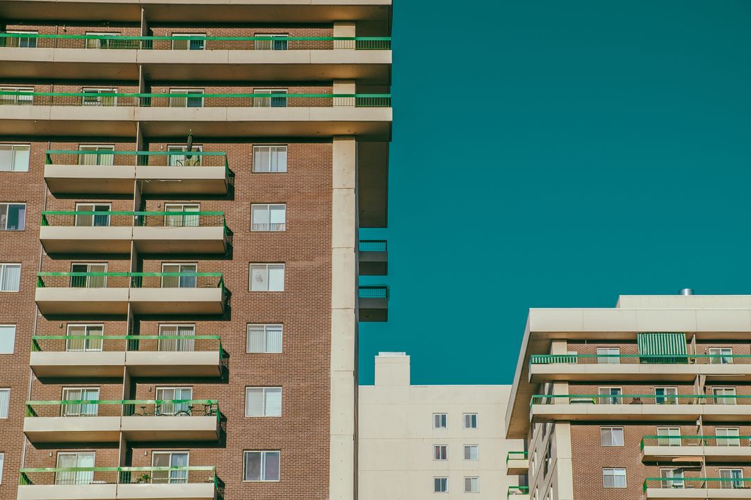 Modern Residential Buildings Against Clear Blue Sky