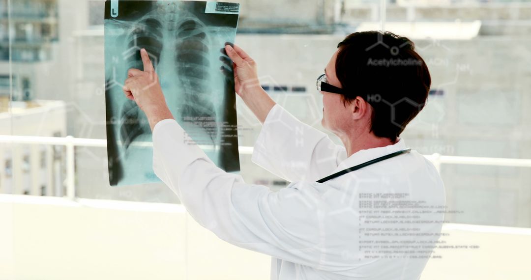 Doctor Analyzing Chest X-Ray with Digital Interface