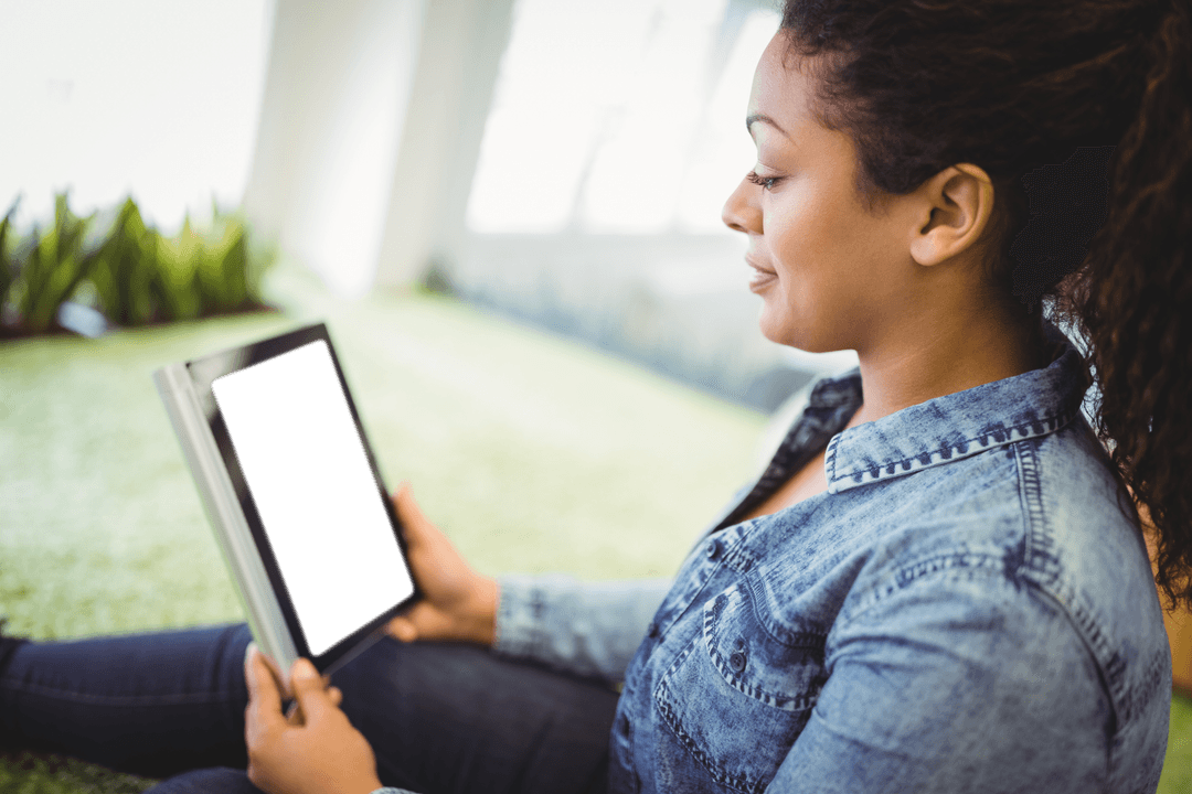 Transparent Screen Showing Woman Using Tablet in Relaxing Park Atmosphere