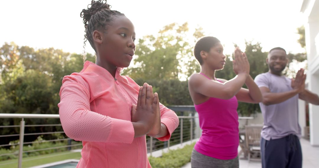 African American Family Practicing Outdoor Yoga Meditation - Free Images, Stock Photos and Pictures on Pikwizard.com