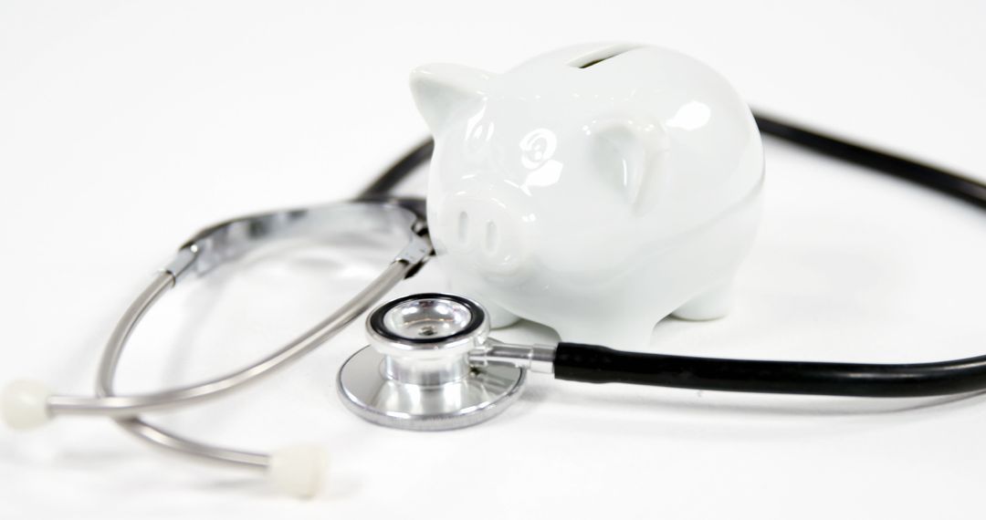 Piggy Bank and Stethoscope Symbolizing Healthcare Costs