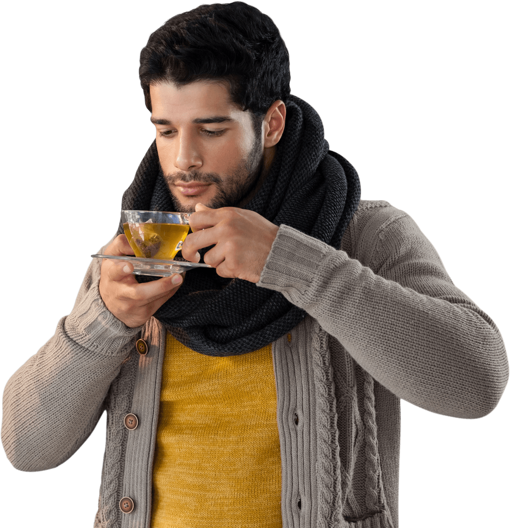 Man Sipping Lemon Tea in Warm Outfit with Transparent Background