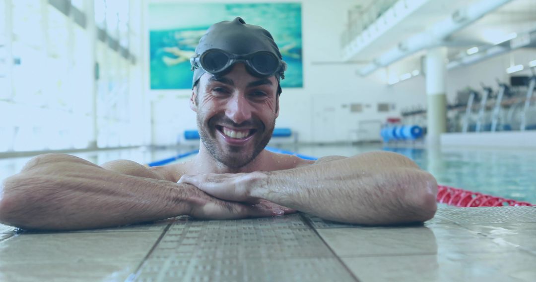Smiling Swimmer Relaxing by Poolside After Workout