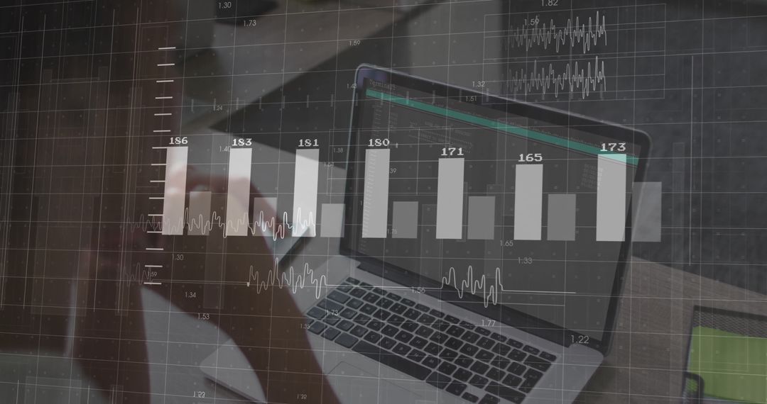 Businesswoman Using Laptop with Data Analysis Graphics Overlay