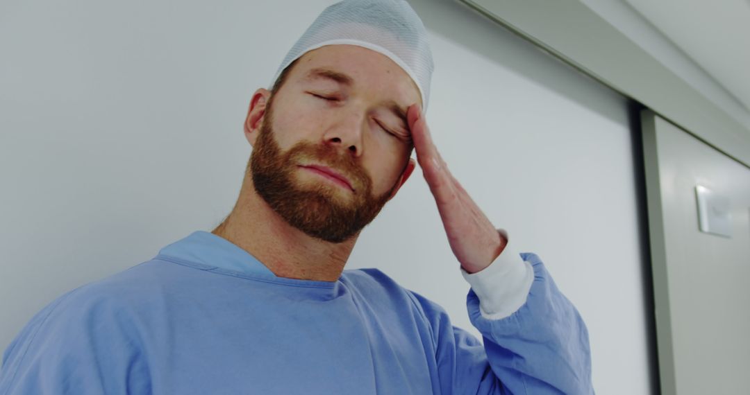 Exhausted Surgeon in Scrubs Taking a Break - Free Images, Stock Photos and Pictures on Pikwizard.com