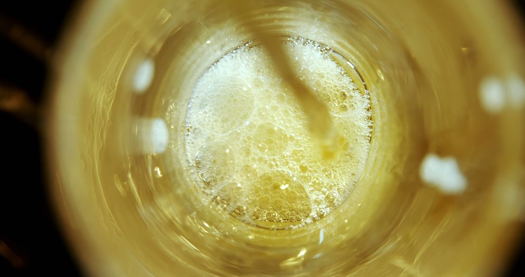 Close-Up View of Bubbles in Beer Glass - Free Images, Stock Photos and Pictures on Pikwizard.com