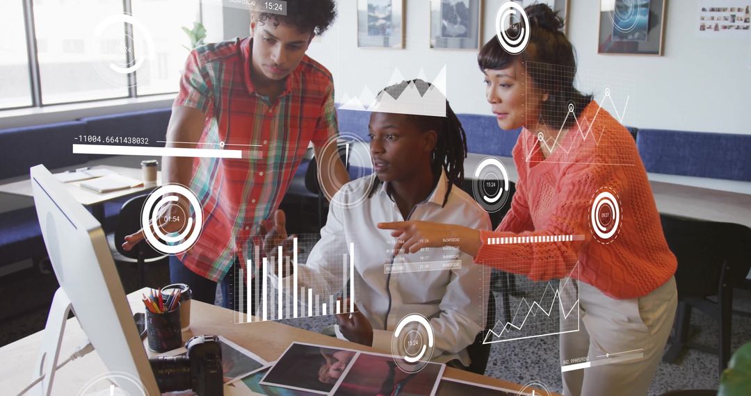 Team Collaborating on Data Analysis in Modern Office Environment