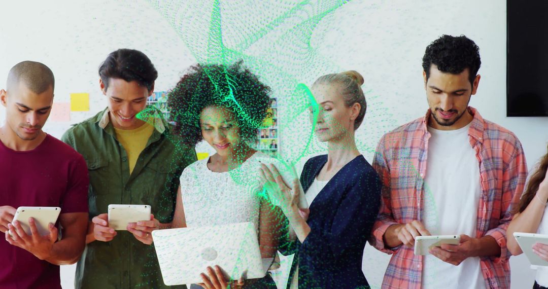 Diverse Tech Team Collaborating on Digital Tablets with Innovative Overlay