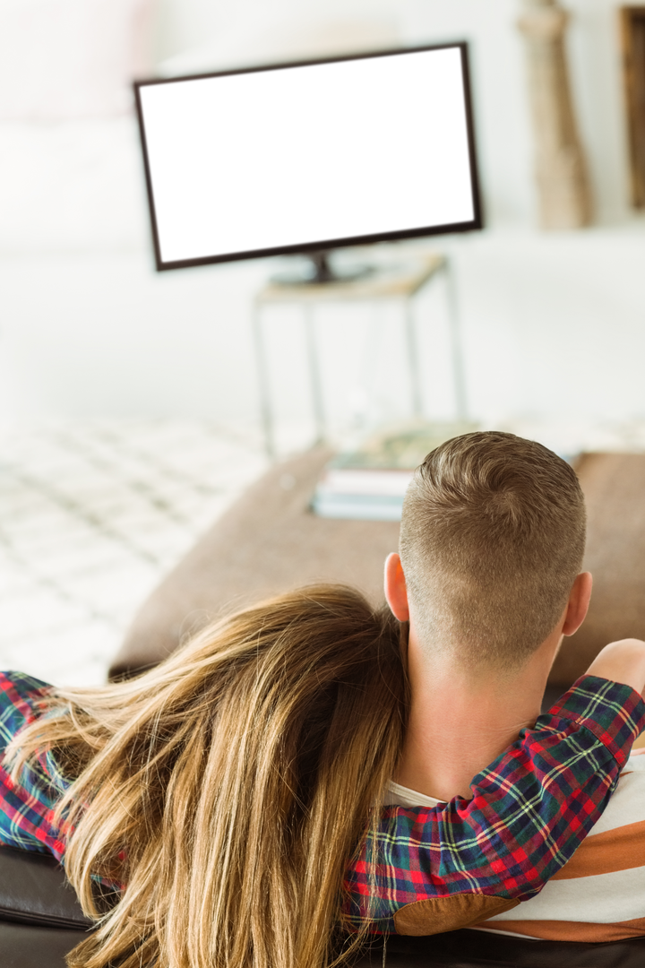 Rear View of Couple Watching Transparent Television in Modern Living Room - Download Free Stock Images Pikwizard.com