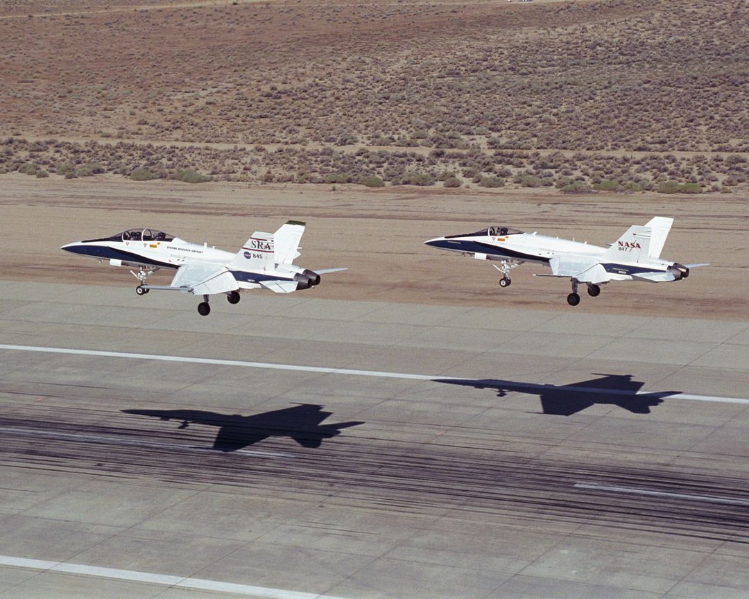 Two NASA F/A-18 Hornets Landing at Edwards Air Force Base - Free Images, Stock Photos and Pictures on Pikwizard.com