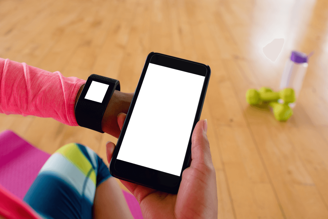 Transparent Tech: Woman in Gym Holding Mobile and Using Smartwatch