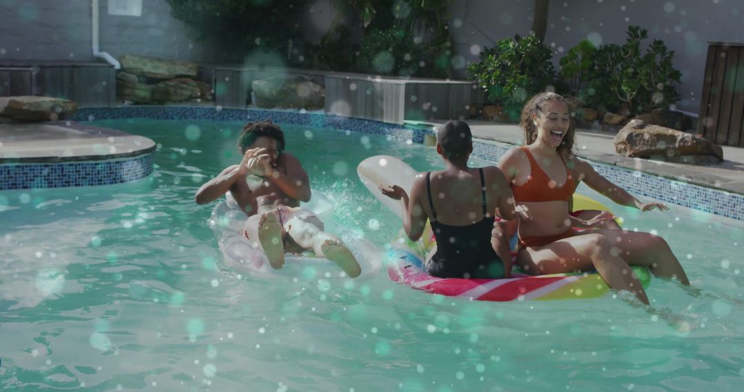 Friends Enjoying Playful Pool Day Amidst Laughter and Colorful Floats