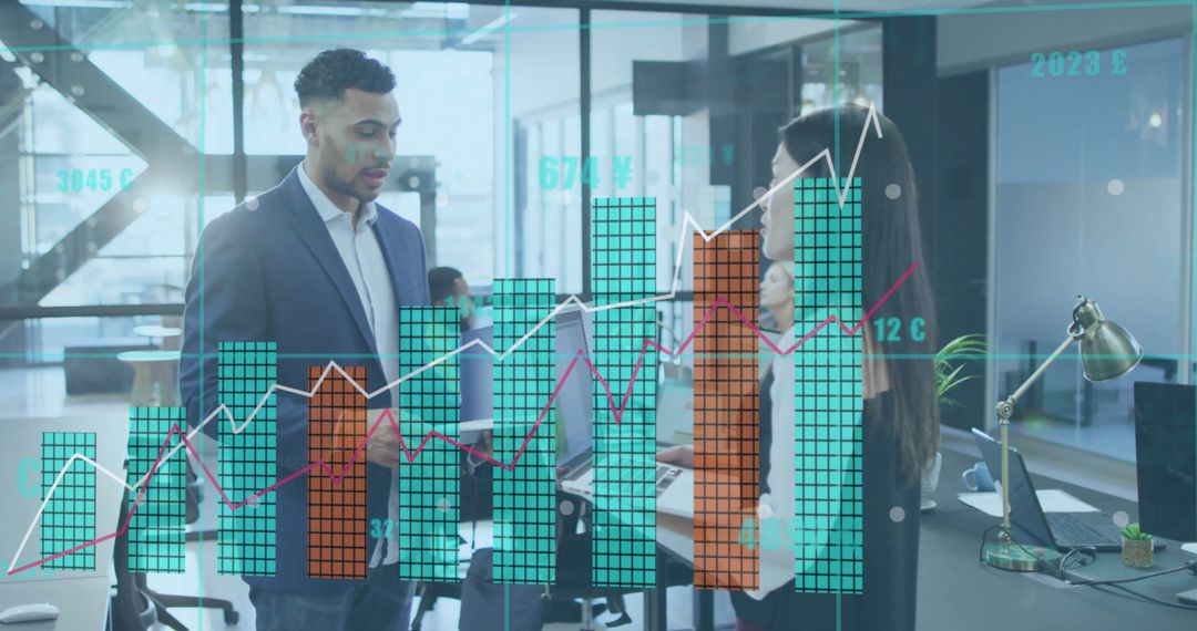 Business Professionals Analyzing Digital Financial Graphs in Modern Office