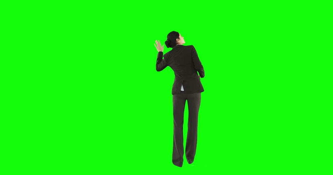 Businesswoman Posing with Hand Gesturing on Green Screen Background - Free Images, Stock Photos and Pictures on Pikwizard.com