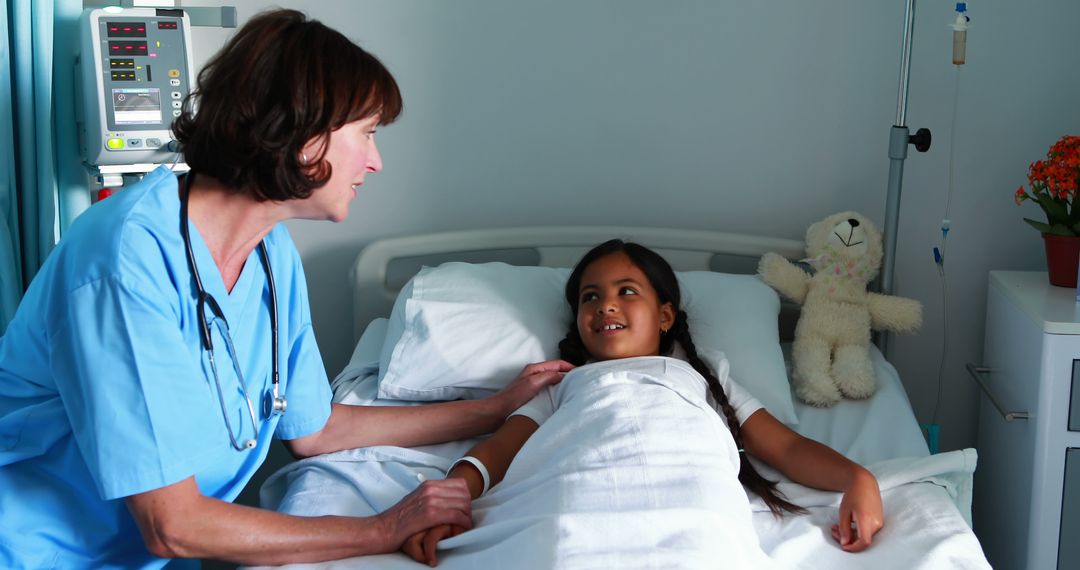 Nurse Comforting Young Patient in Hospital Bed - Free Images, Stock Photos and Pictures on Pikwizard.com