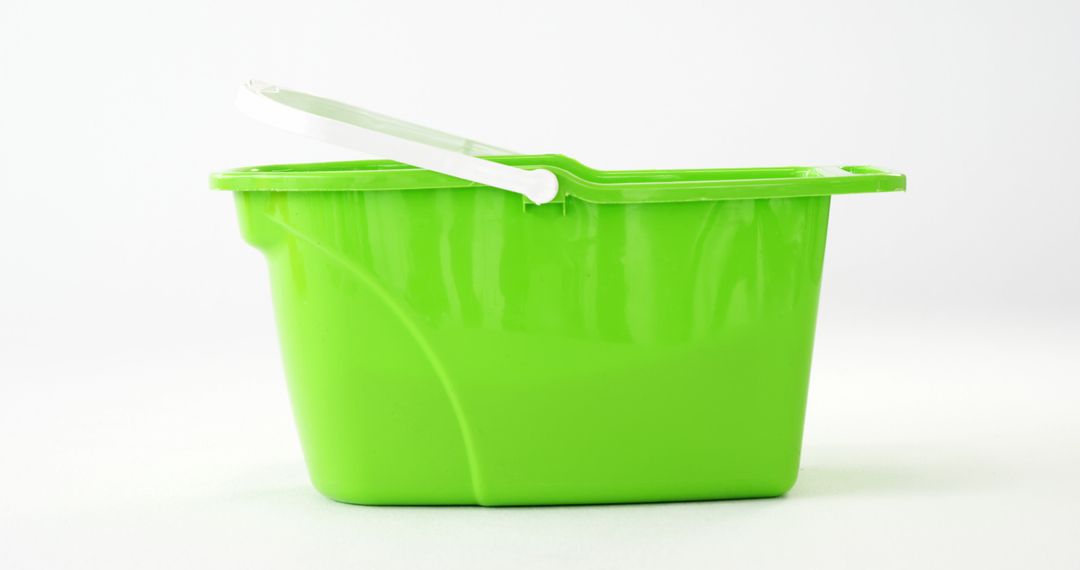 Bright Green Plastic Bucket with Handle on White Background - Free Images, Stock Photos and Pictures on Pikwizard.com