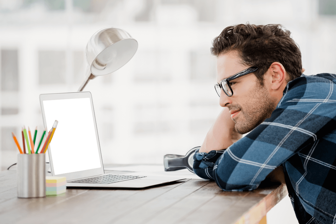 Transparent Screen Laptop on Wooden Desk with Smiling Man