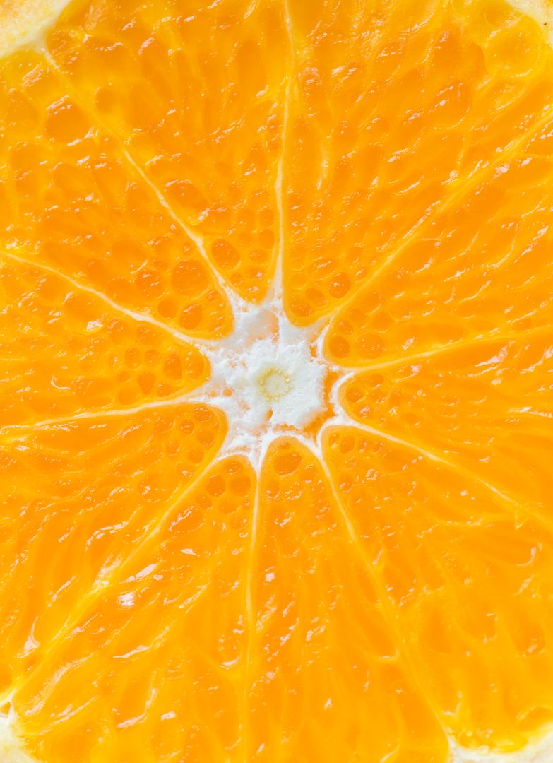 Close-up of Fresh Juicy Orange Slice Texture