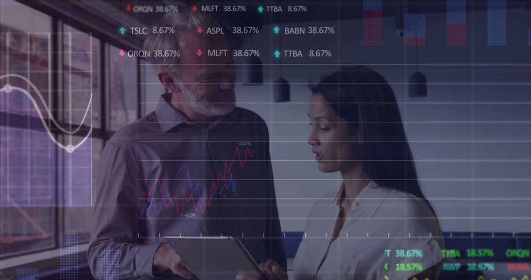 Finance Professionals Analyzing Stock Market Data on Digital Tablet in Office - Free Images, Stock Photos and Pictures on Pikwizard.com