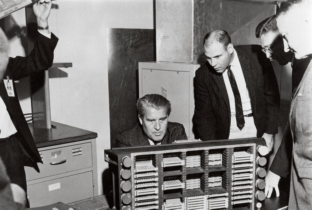 Dr. von Braun examining Saturn computer at Marshall Space Flight Center, March 10, 1966 - Free Images, Stock Photos and Pictures on Pikwizard.com