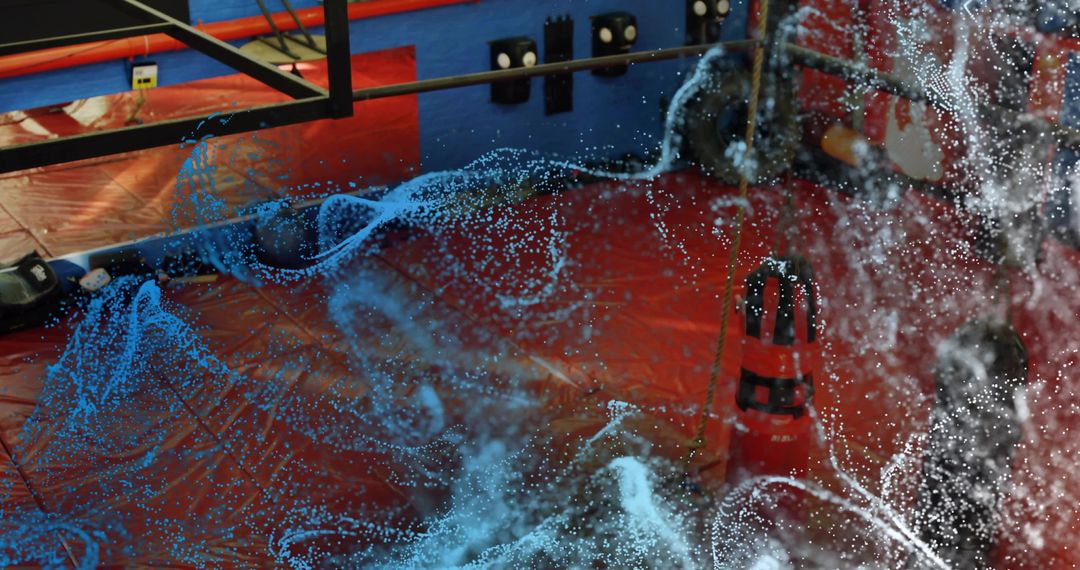 Swirling Fluid Simulation on Red Padded Mat in Demo Lab